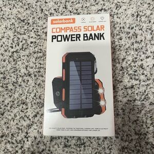 Orange and Black Compass Solar Power Bank charger